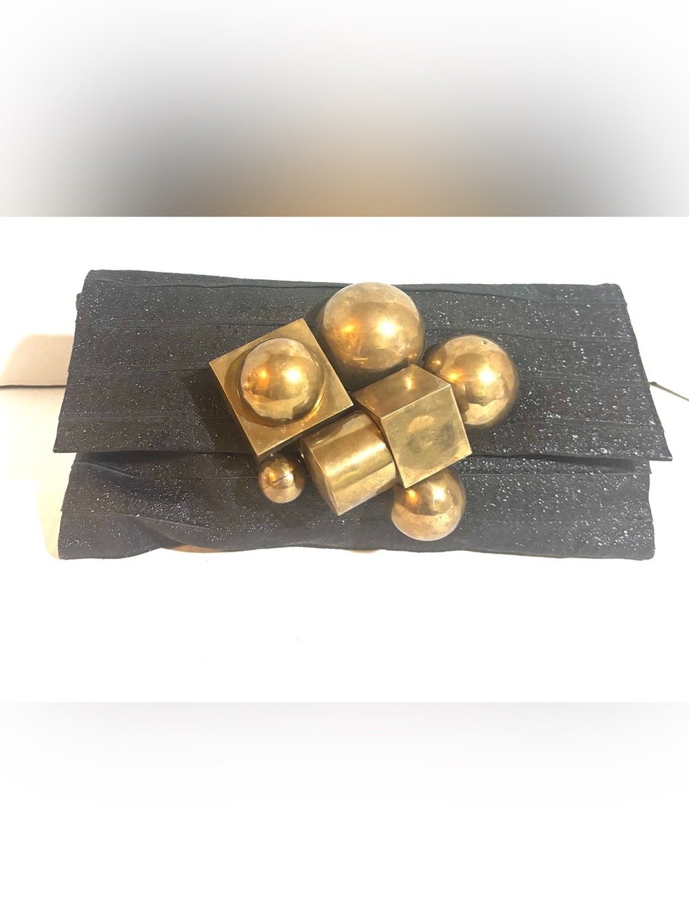 Vintage handmade Black clutch with Gold Sculptural Accents